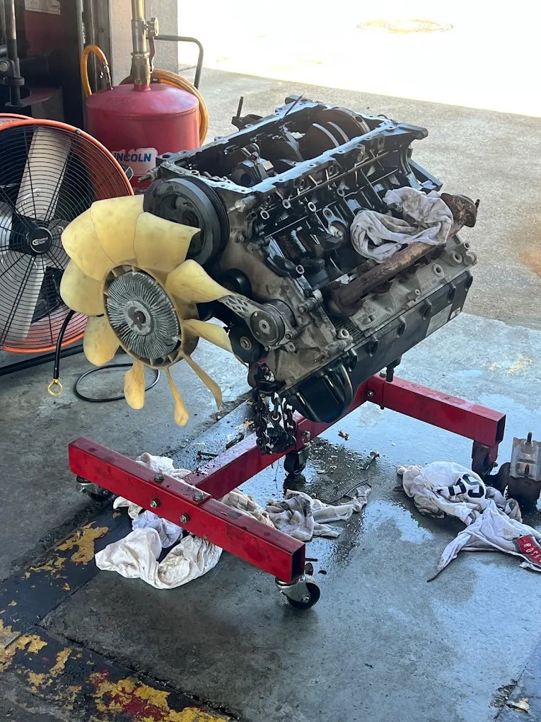 Engine on a stand during a build at Car Time Automotive